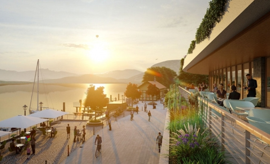 Menschen spazieren entlang der Uferpromenade